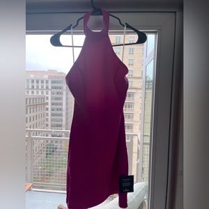 Never worn, tags still on! This dress is perfect for a holiday party.